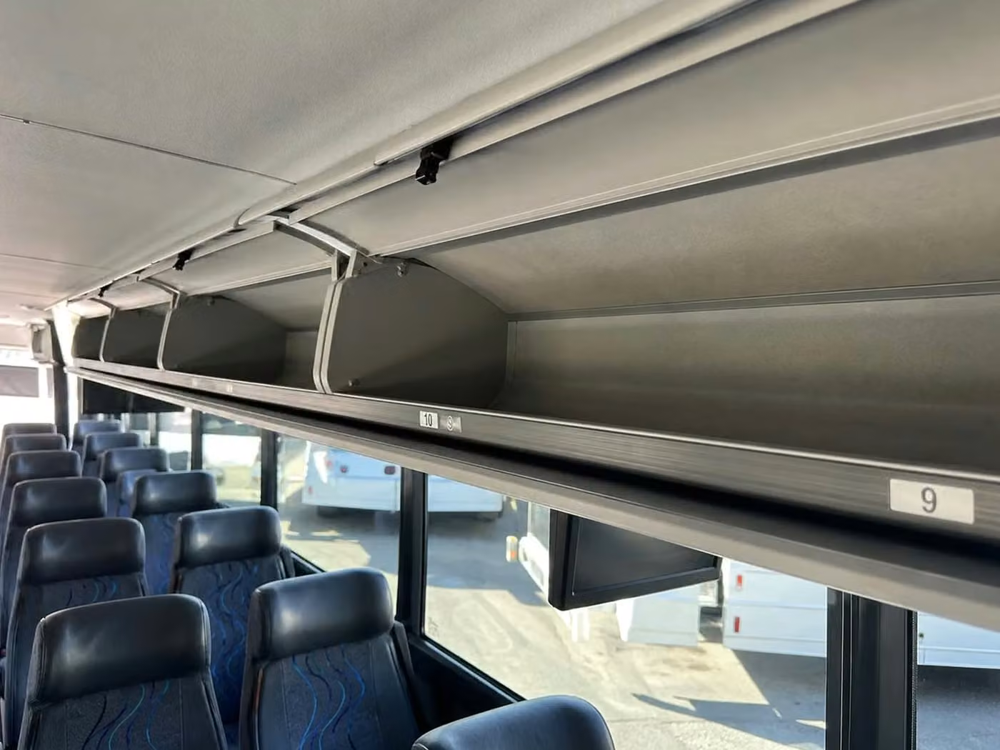 post falls 25 passenger minibus overhead storage