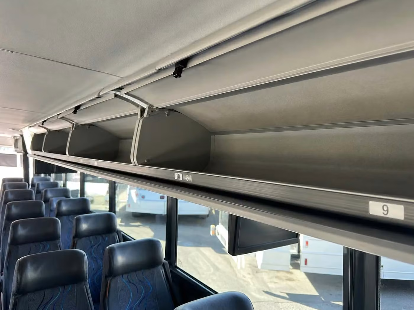 post falls 28 passenger minibus overhead storage